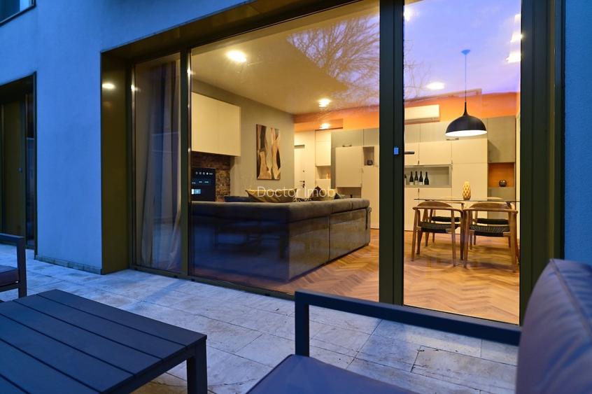 Rafinament, liniște și spațiu exterior privat în centrul Bucureștiului - 13