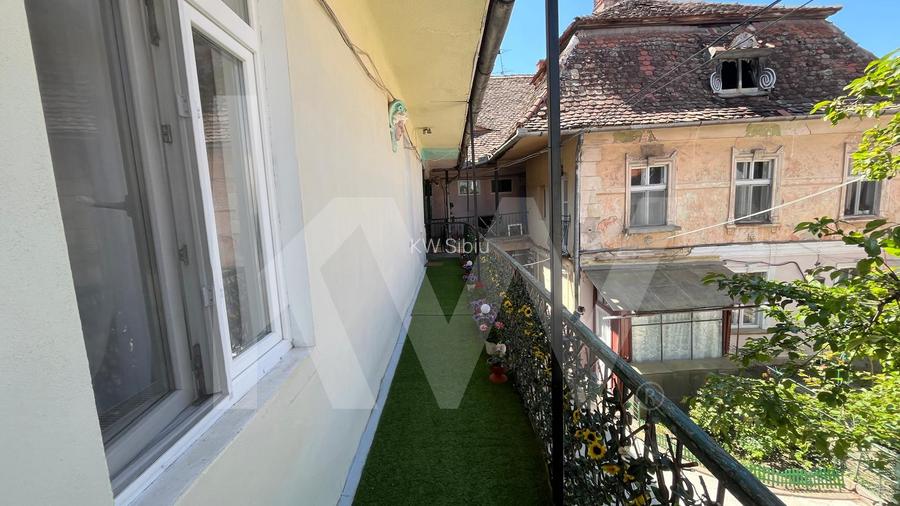 2 camere în inima orașului – ideal pentru locuit sau investiție - 10