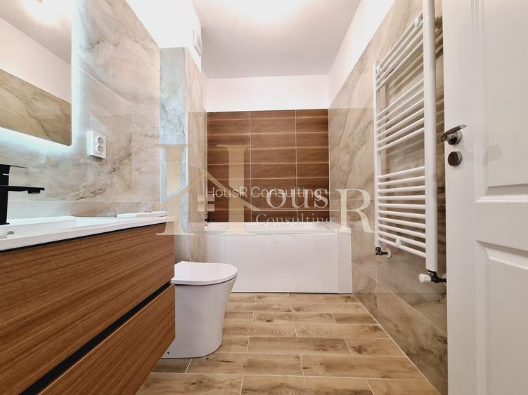 Spatios, 55 mp utili. Decomandat. Bucatarie inchisa. - 12