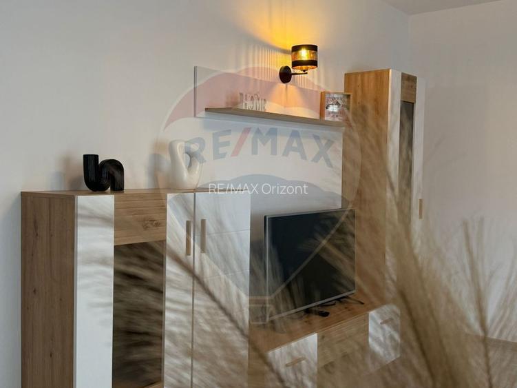 Apartament cu 3 camere, 2 bai și loc de parcare - 45