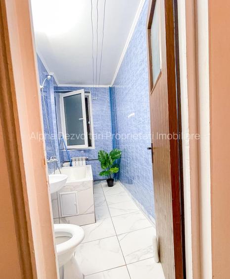 Titan, Auchan, str. Jean Steriadi, - 7