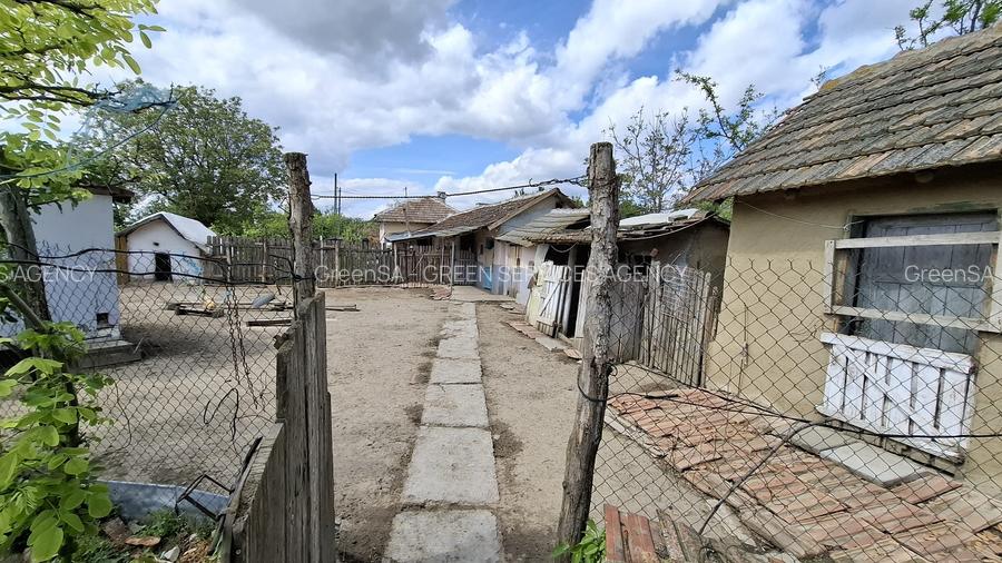 Casa paianta locuibila. Teren 1772 mp, desch. 30 ml. Asfalt, curent, apa, canal. - 17