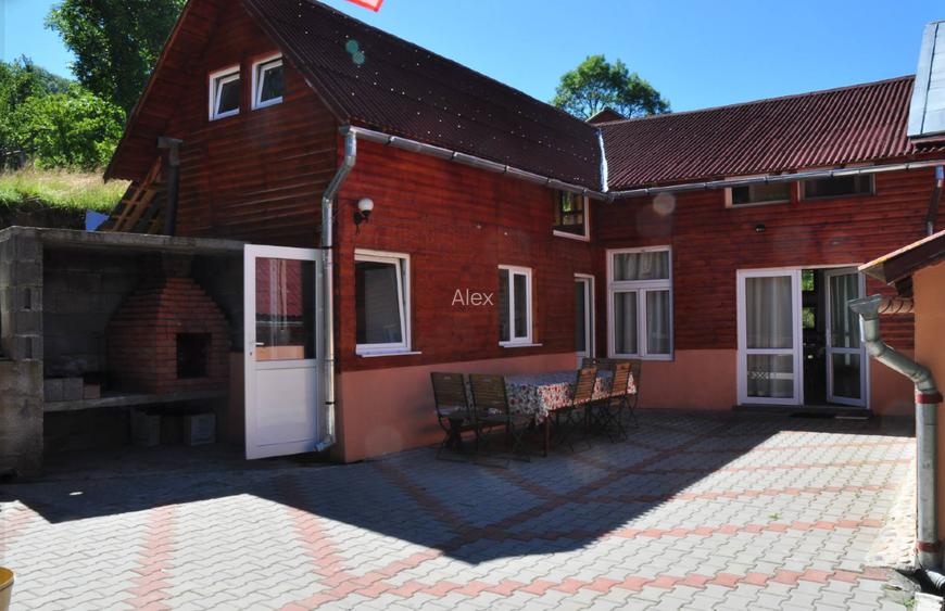 Complex turistic în Munții Apuseni–3 clădiri(cabane), 10 camere, teren 3740 mp  - 9