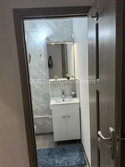 Vanzare apartament cu 3 camere si 2 bai,  decomandat,  renovat,  parter zona CET - 6