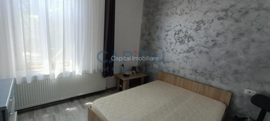 Constructie cu 3 apartamente + teren+ 2 spatii comerciale - 3