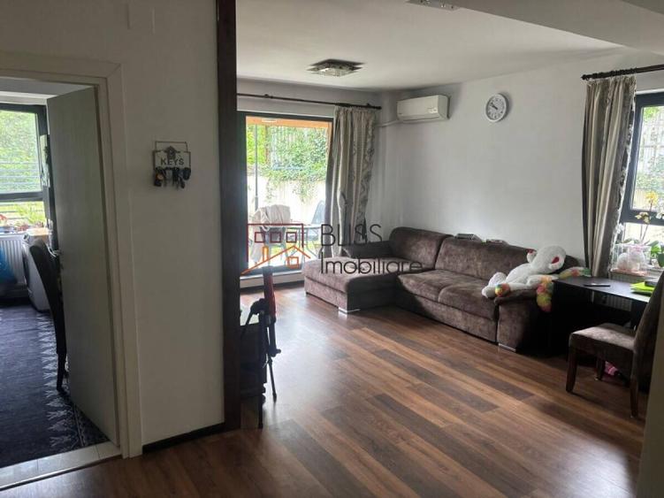 Apartament cu grădină generoasă și parcare