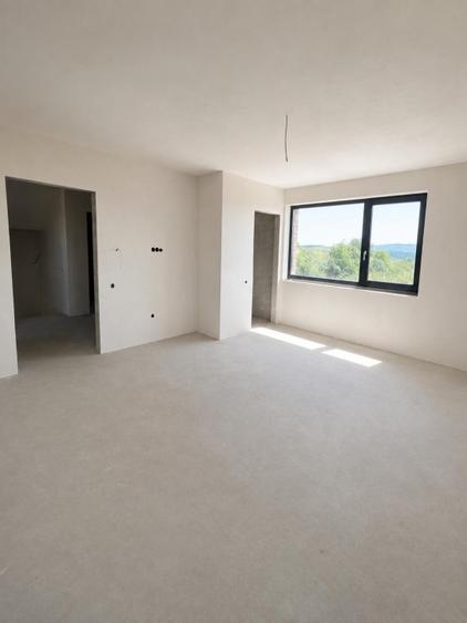 Casă individuală Dezmir | 214 mp utili | 450 mp teren | Garaj dublu | Terasă