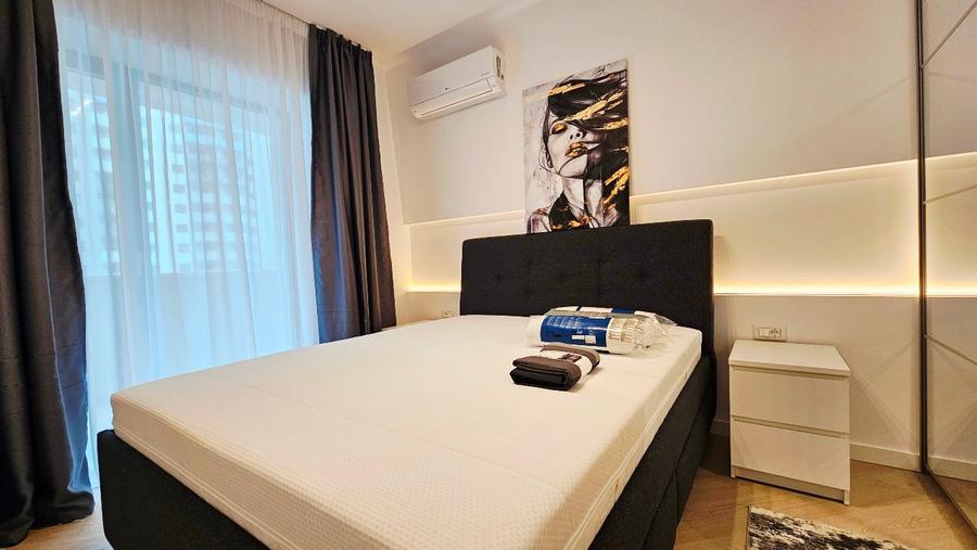 Ofer spre închiriere apartament 2 camere decomandat plus loc parcare subteran