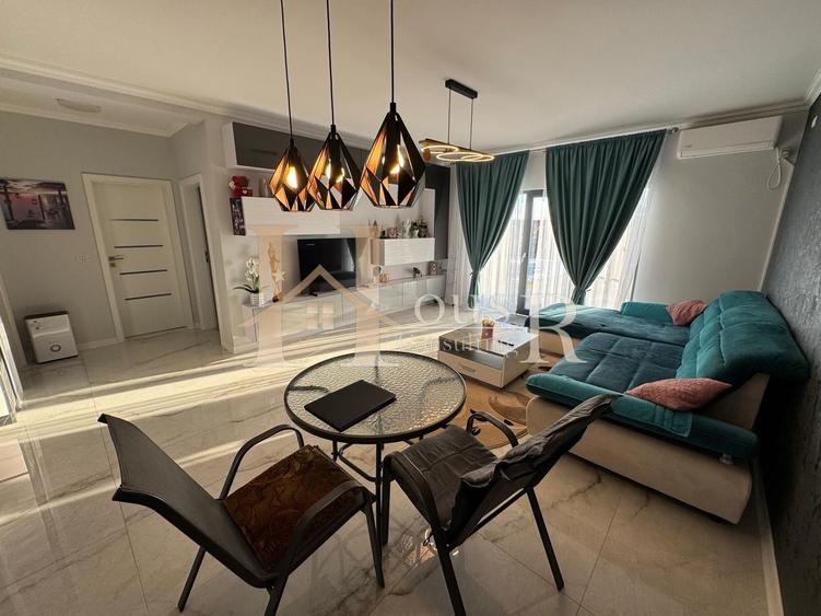 Duplex pe Parter.Mobilat si Utilat complet.Teren generos