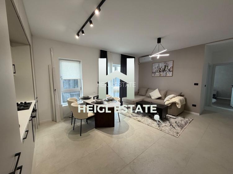 Apartament mobilat cu designer cu 2 camere si gradina in Braytim - 2