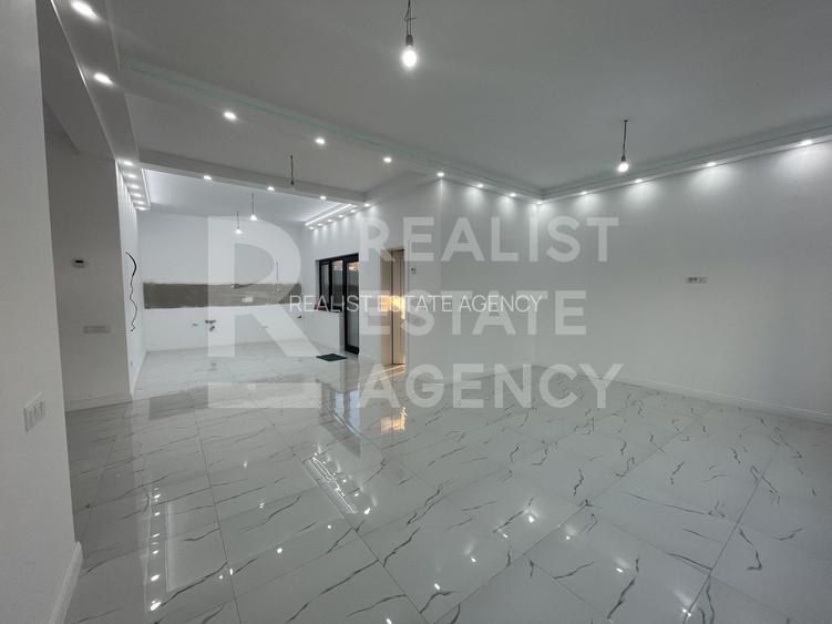 Vânzare, casă, 4 camere, 100 mp utili, teren 630 mp + garaj - 2