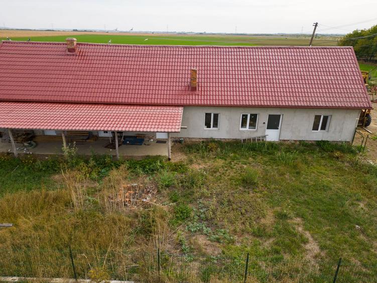 Casă cu teren 13 418 mp intravilan