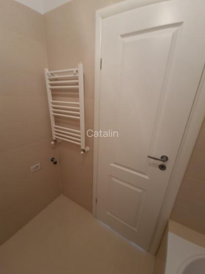 Vând apartament cu 2 camere, decomandat nou  + loc de parcare, situat in complex - 12