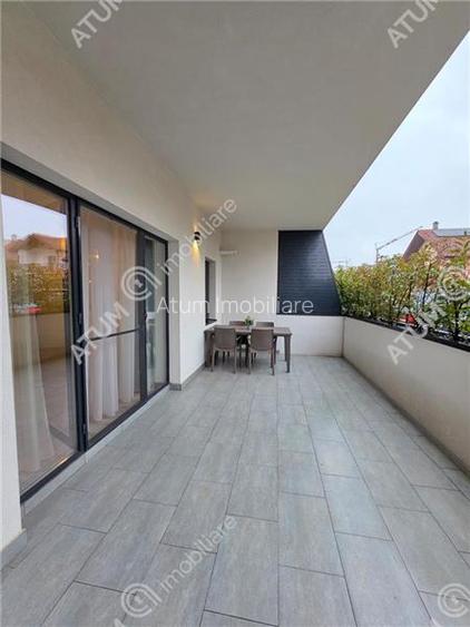 Apartament cu 3 camere decoamndate curte si terasa in zona Selimbar - 14