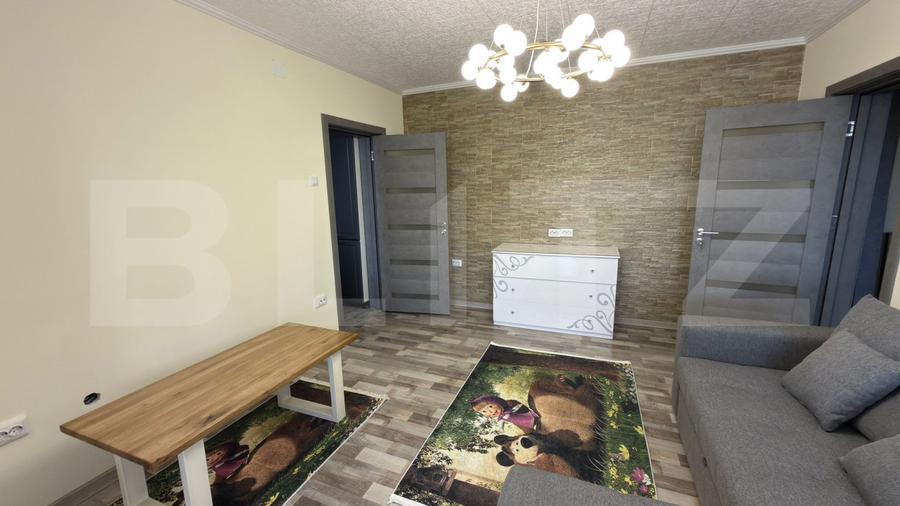 Apartament complet renovat, 57 mp, 2 camere, etaj 4 – zona Micro 15