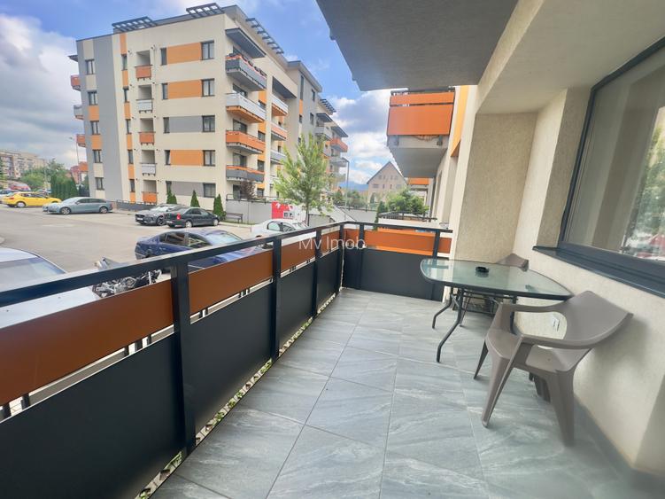 Apartament  cu 2 camere de inchiriat in zona Tractorul Coresi cu dressing,parter - 6