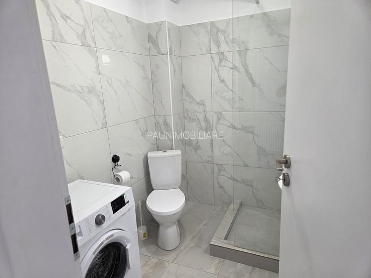 Garsoniera utilata,mobilata ,totul nou ,prima inchiriere ,str Oituz nr 71 - 11