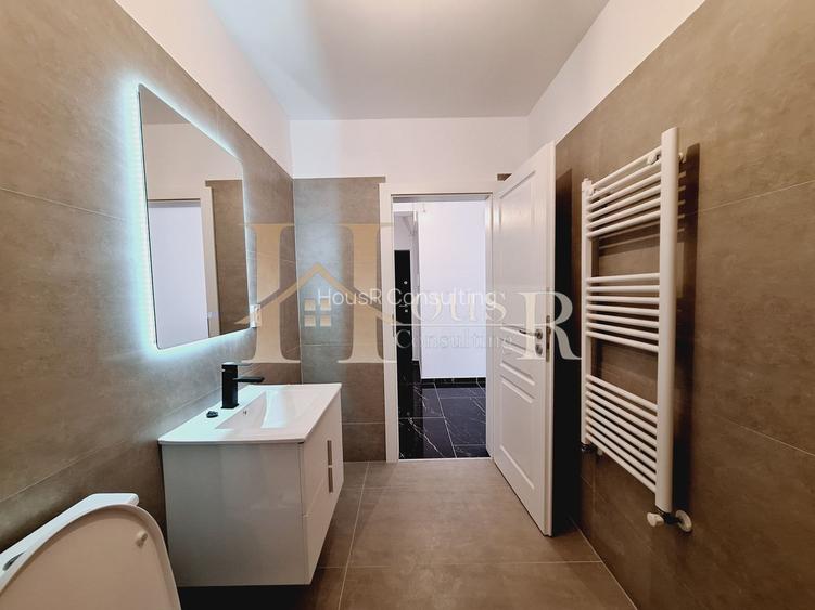 Etajul 1. Bucatarie inchisa. 35 mp utili. Decomandat. - 9