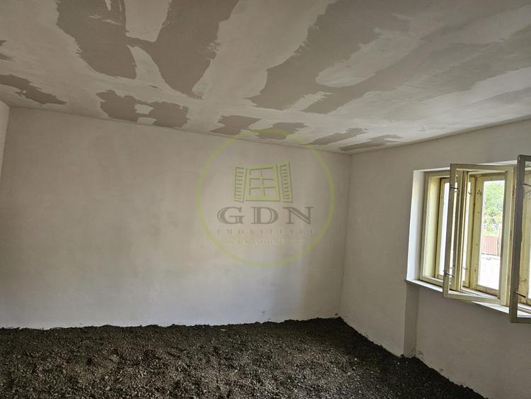 Casa de vacanta semifinisata + 1600 mp teren