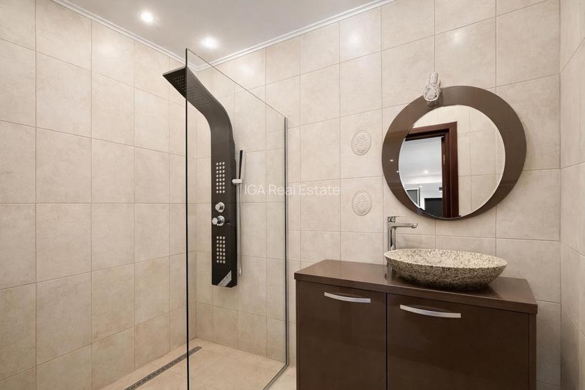 Un apartament ca o casa cu terasa generoasa si doua locuri de parcare - 12