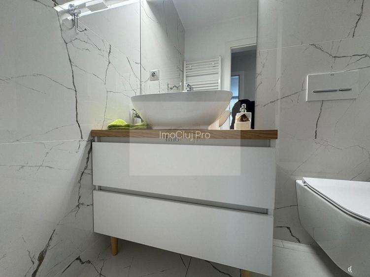 Vânzare  3 camere Grigorescu- -etaj 5/10-2 băi- parcare subter- terasa - 17