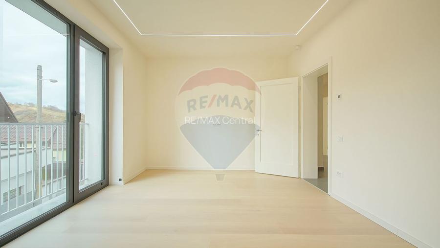 Armonie între tradiție și modernitate – Vilă contemporană în Brasov - 12