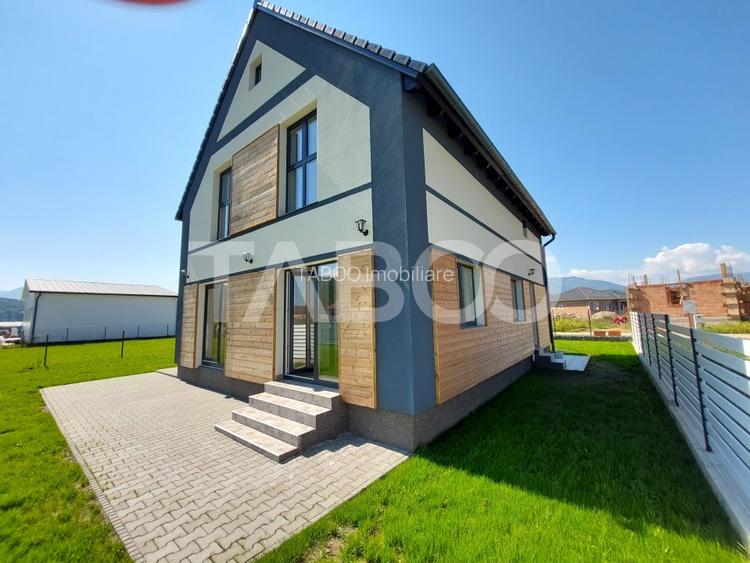 Casa de vanzare 4 camere 3 bai 119 mp cu teren 470 metri in Talmaciu - 2