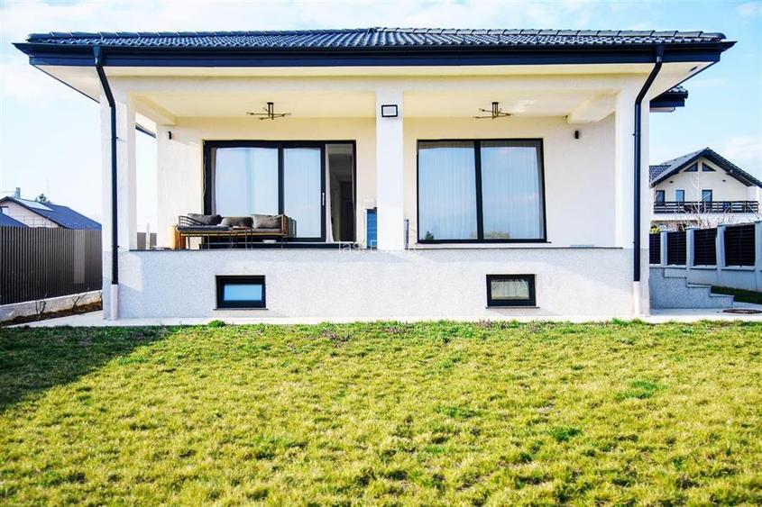 Casa intr-o zona linistita cu garaj si teren-1091 mp - 18