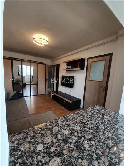 Inchiriere Garsoniera in bloc de apartamente, zona Astra, moderna - 9