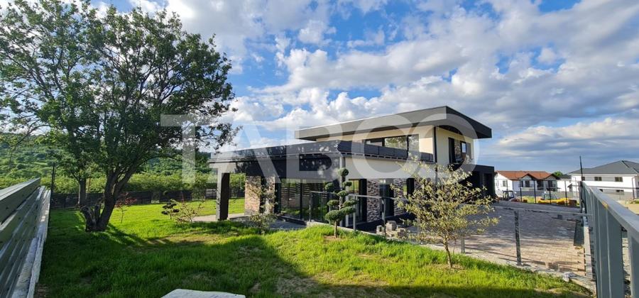 Casa cu piscina interioara in livada Cisnadie