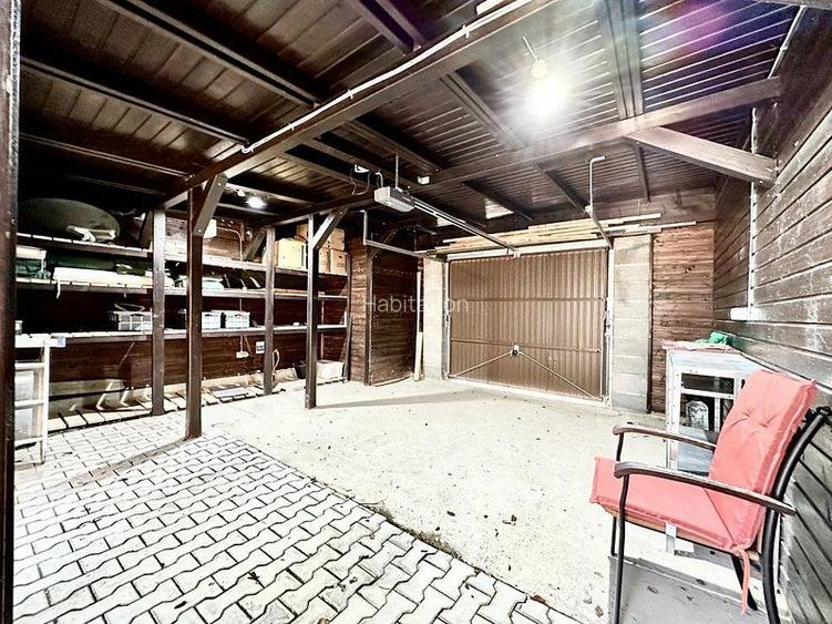 Apartament generos -curte proprie - garaj - 34