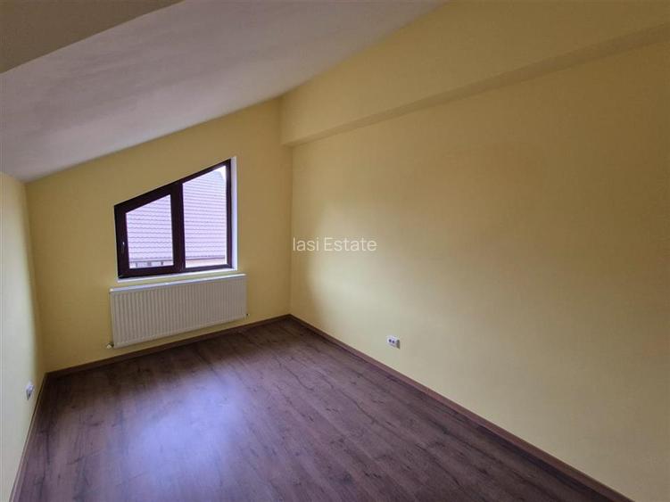 Casa de vanzare individuala cu garaj in Bucium - 9