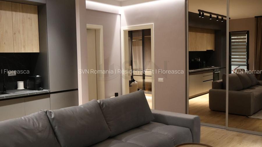 REA1028338 Apartament de trei camere cu parcare supraterana acoperita - 2