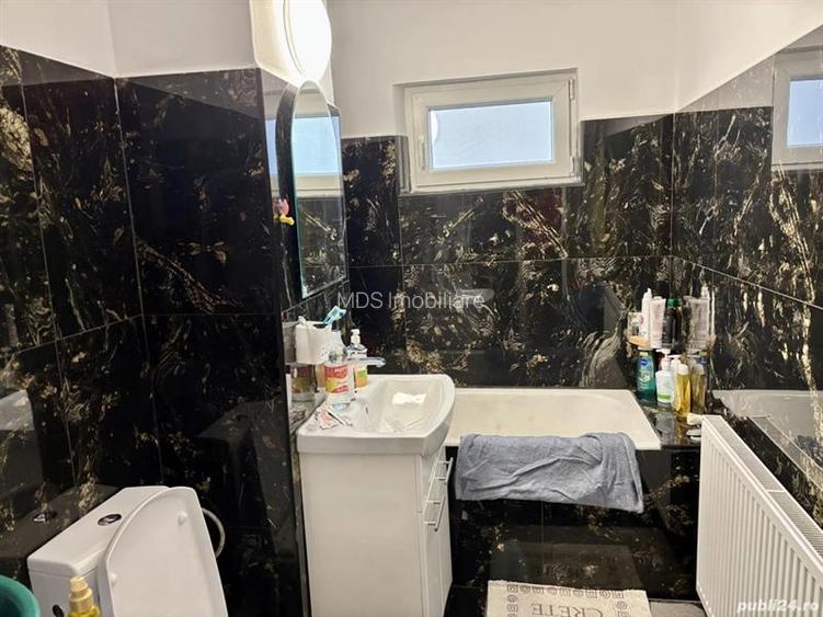 Decomandat cu 2 băi si 2 balcoane la etajul 3 - 7