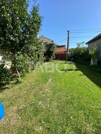 Casa de vanzare 3 camere 90 mpu teren liber 1095 mp Persani - 2