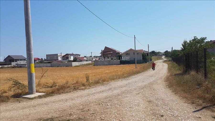 TEREN INTRAVILAN CONSTRUIBIL 469 MP. LANGA CASE ZONA IN DEZVOLTARE PRET 17.500 E - 6