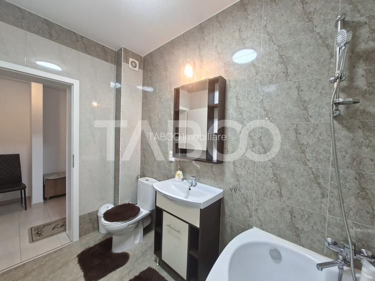 Garsoniera decomandata tip studio moderna bloc nou parcare Selimbar - 9