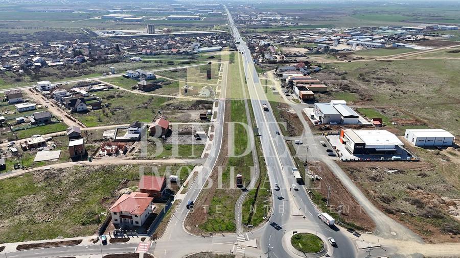 Teren 1053 mp  Servicii langa drum 4 benzi Giarmata