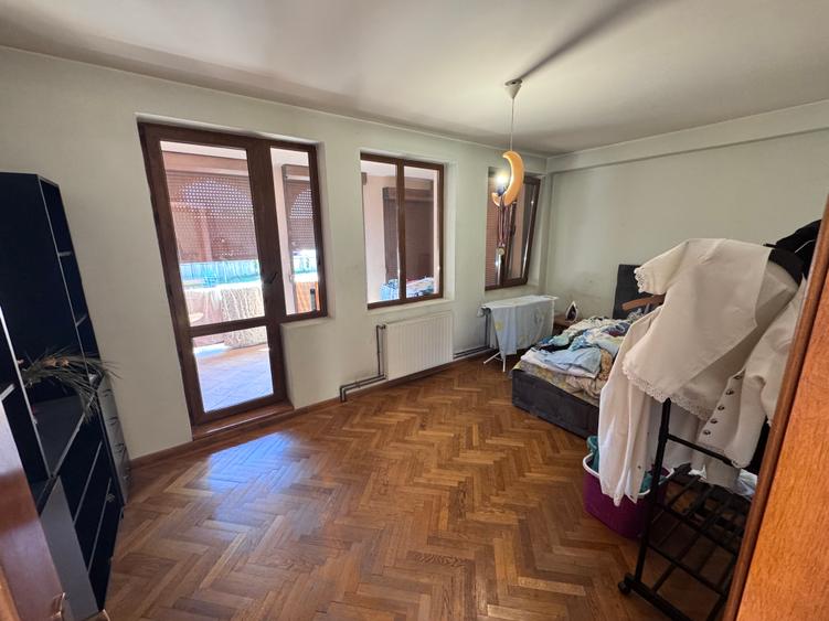 Casa individuala P+1+M amplasata pe un teren de 1612 mp.