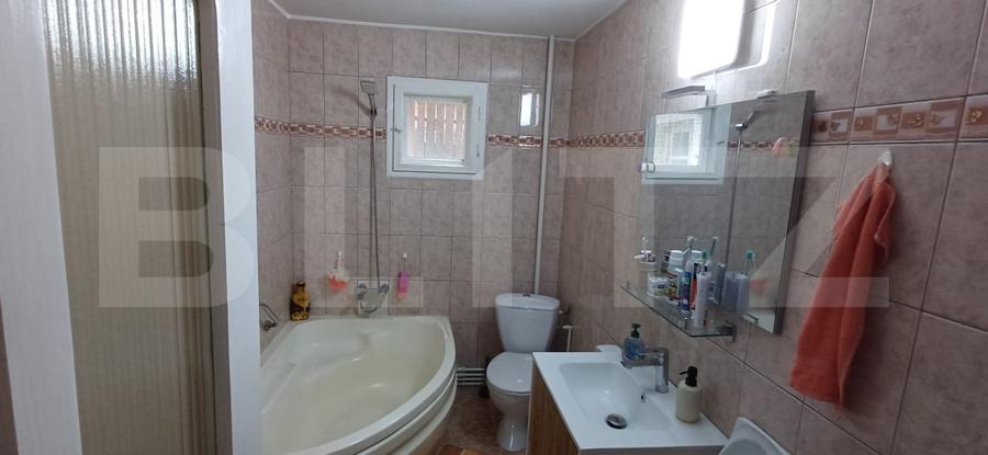 Casă individuală de vânzare – zonă liniștită, teren generos 1800 mp -228mp utili