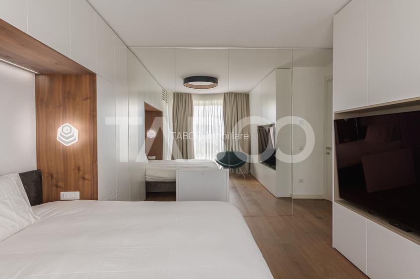 Apartament de lux de vanzare cu 3 camere cu gradina de 200 mp