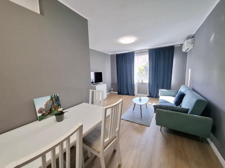 2-room apartment | view Sala Palatului park | subway Piata Romana |