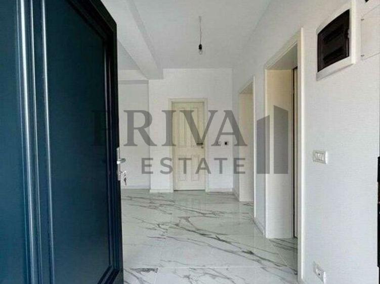 1/2 Duplex 124 mp utili + 330 curte. Dormitor parter,Bucatarie închisă