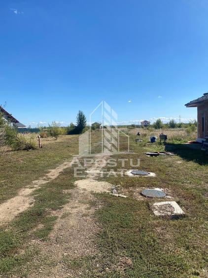 Teren 780 mp intre case - intrare Giarmata Vii