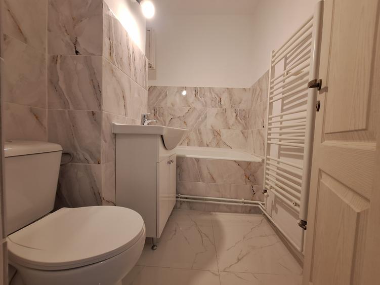 Apartament cu 2 camere-complet renovat-centrala proprie-parter-Sagului