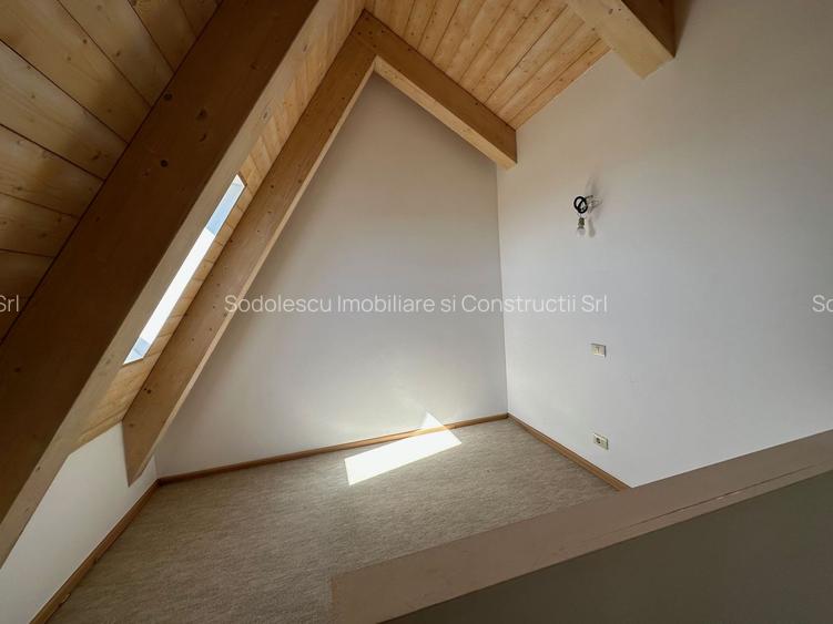 CASA SPATIOASA  CU GARAJ SI TEREN DE 600 MP - 18