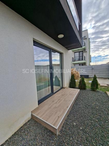 Bloc nou,  apartament   cu  parcare si curte proprie. - 11