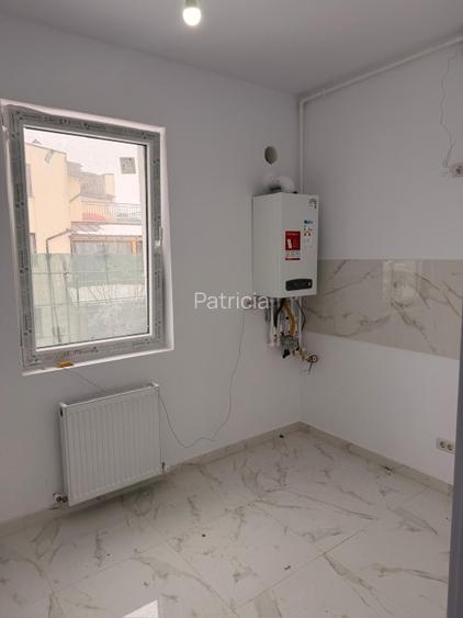 Studio 40 mp total, decomandat, bucătărie separată + loc de parcare inclus  - 15