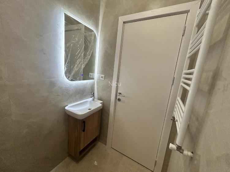 Casa individuala 3 camere,2 bai,o bucatarie,beci incalzire pardoaseala teren 450 - 9