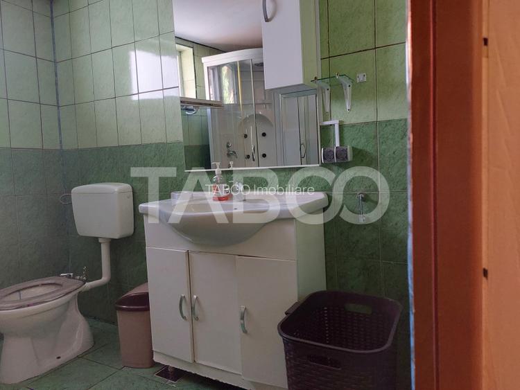 Casa 214 mp utili singur in curte 800 mp teren zona centrala Cisnadie - 10